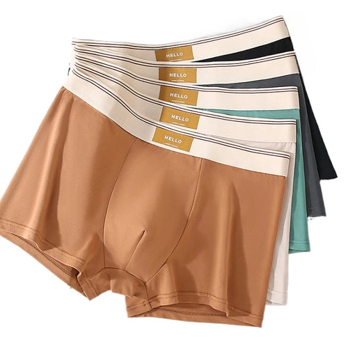 Breathable men's boxer shorts made of milk silk, showing a comfortable fit and smooth fabric in a stylish design.