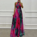 Vintage print Fanbety women's halter maxi dress by SHOWLU FASHION STORE featuring a bohemian-inspired design and flowing silhouette.