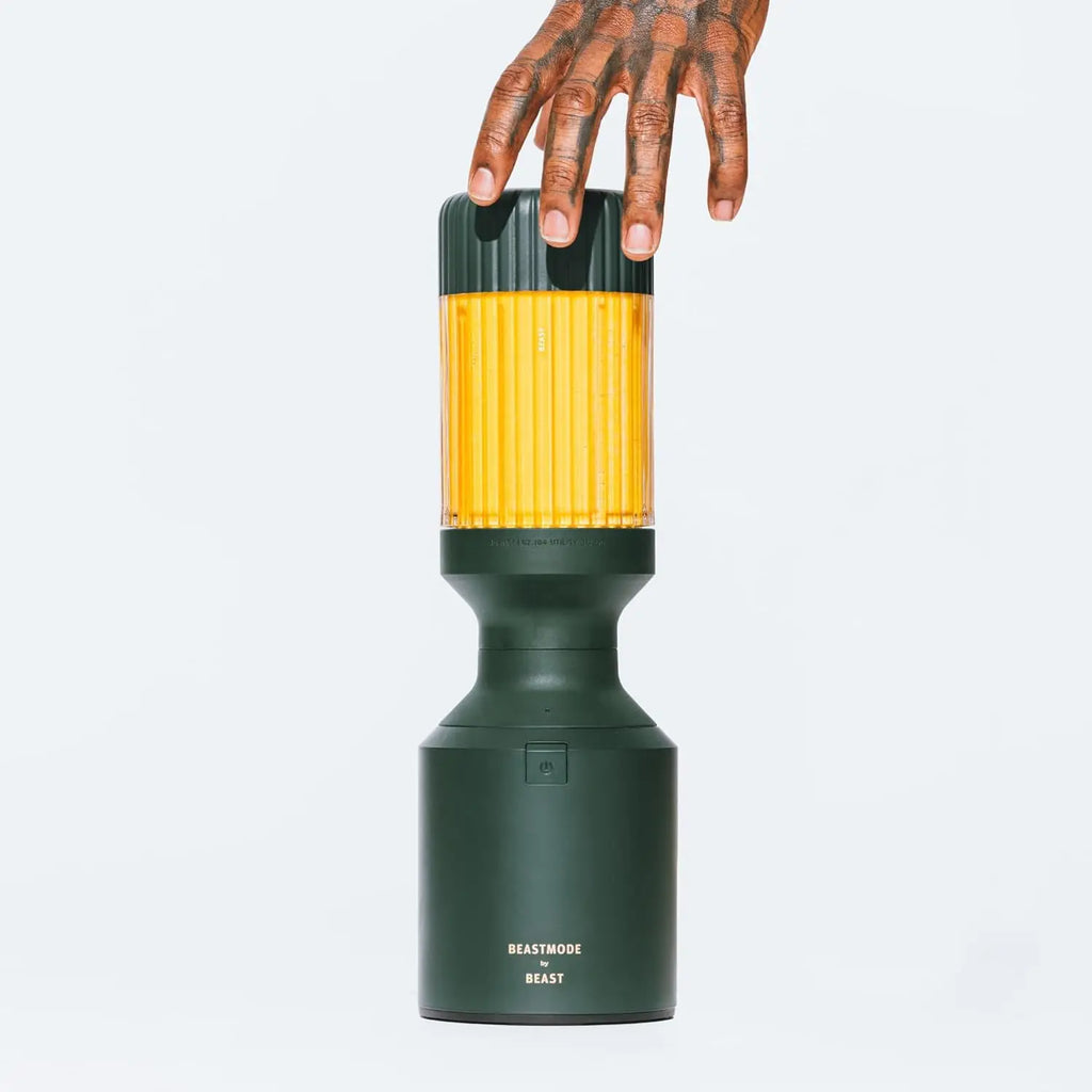Mode By Health Blender with Marshawn Lynch branding, showing a sleek smoothie and shake maker on a countertop.