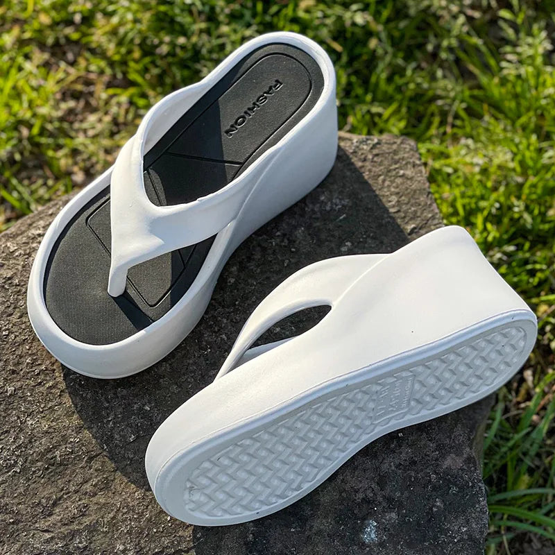SHOWLU Women's platform wedge flip flops with thick EVA soles, summer sandals featuring a stylish design and comfortable fit.