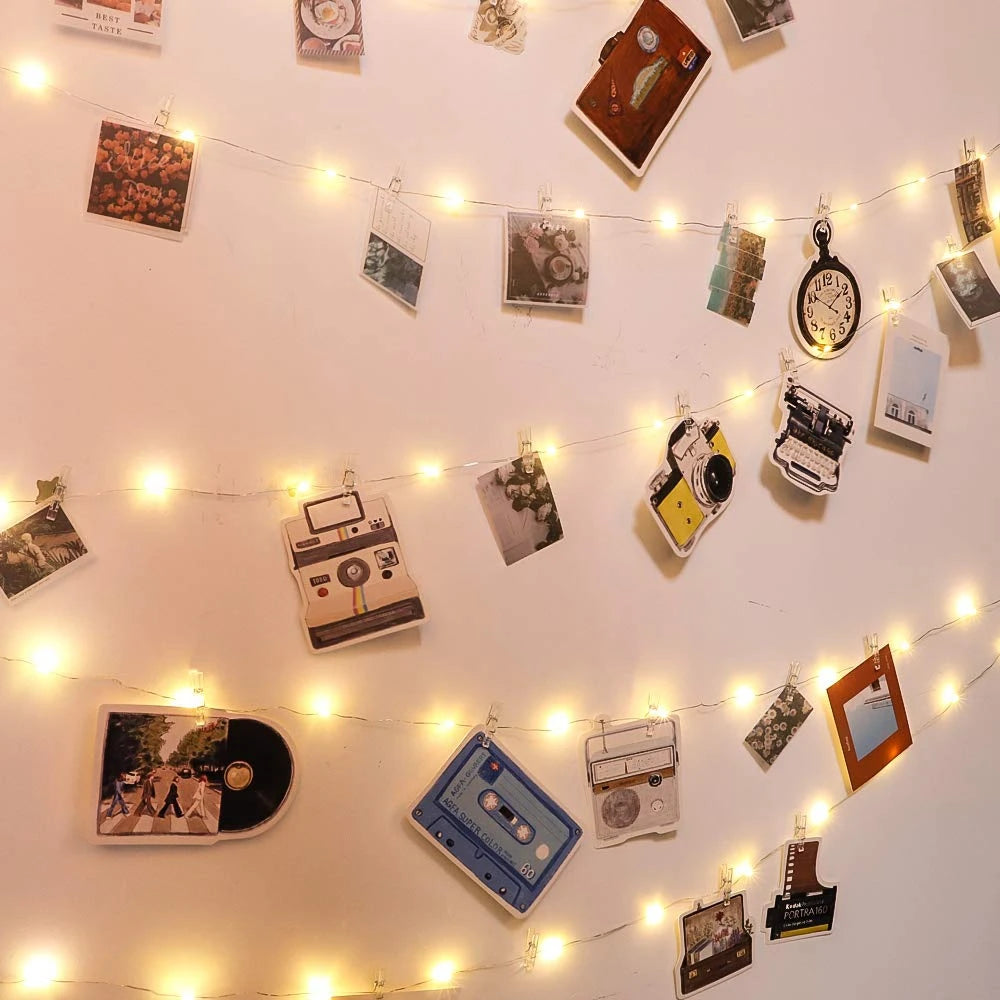 Showlu Smart General LED photo clip string lights hanging with clips and warm white LEDs for decorative lighting.