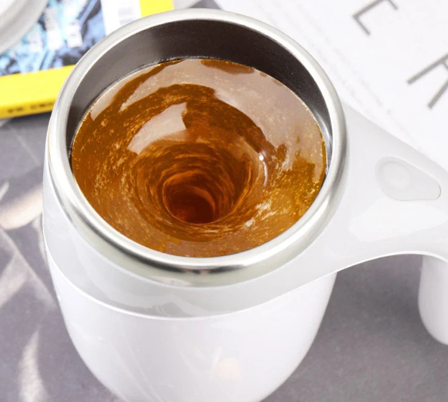 Showlu automatic self-stirring stainless steel coffee mug with magnetic stirring mechanism and ergonomic handle.