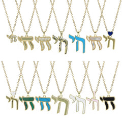 A collection of gold-tone Hebrew Chai pendant necklaces featuring various colors and stone inlays.