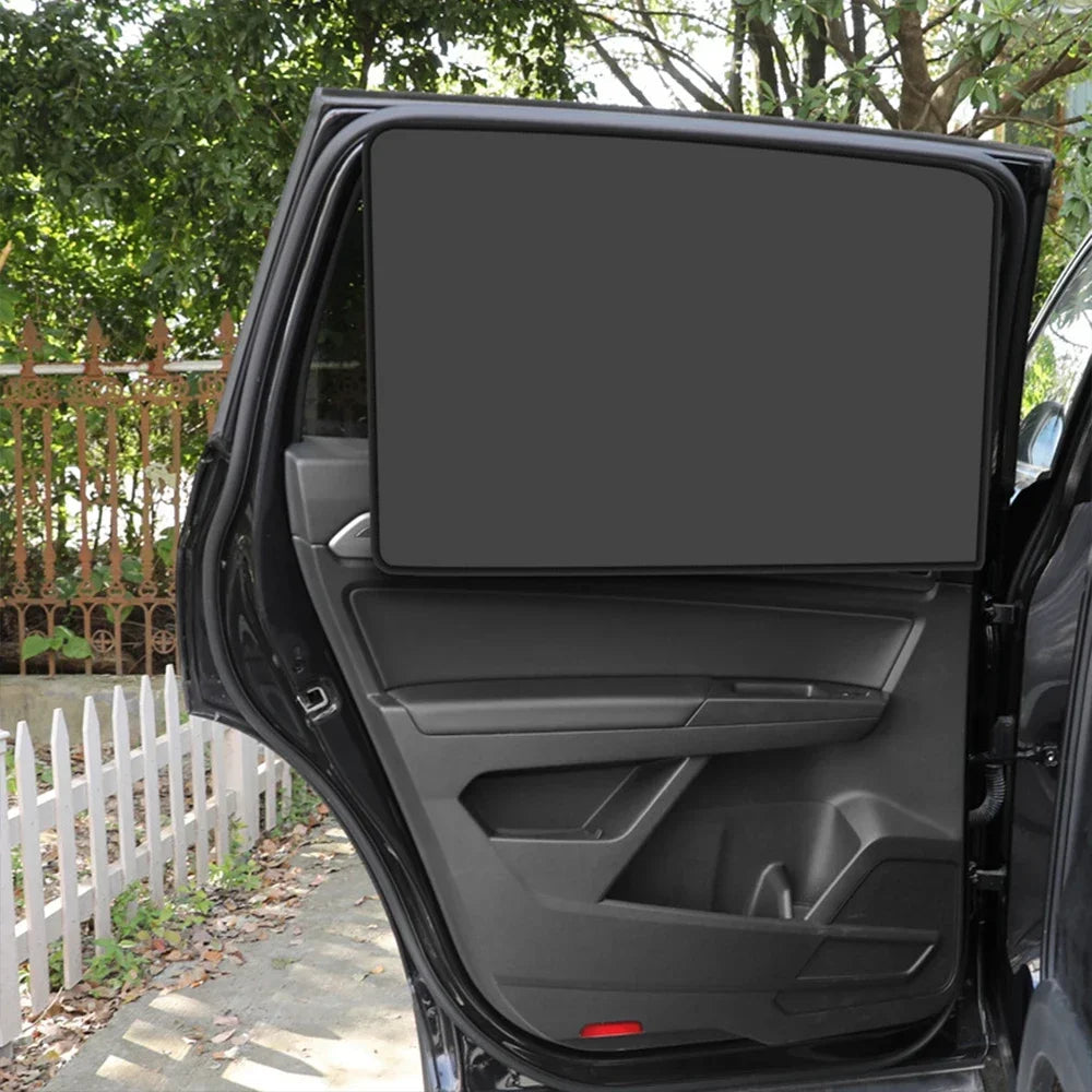 Showlu Smart General magnetic car sunshade attached to a vehicle window, providing UV protection and cool shade.