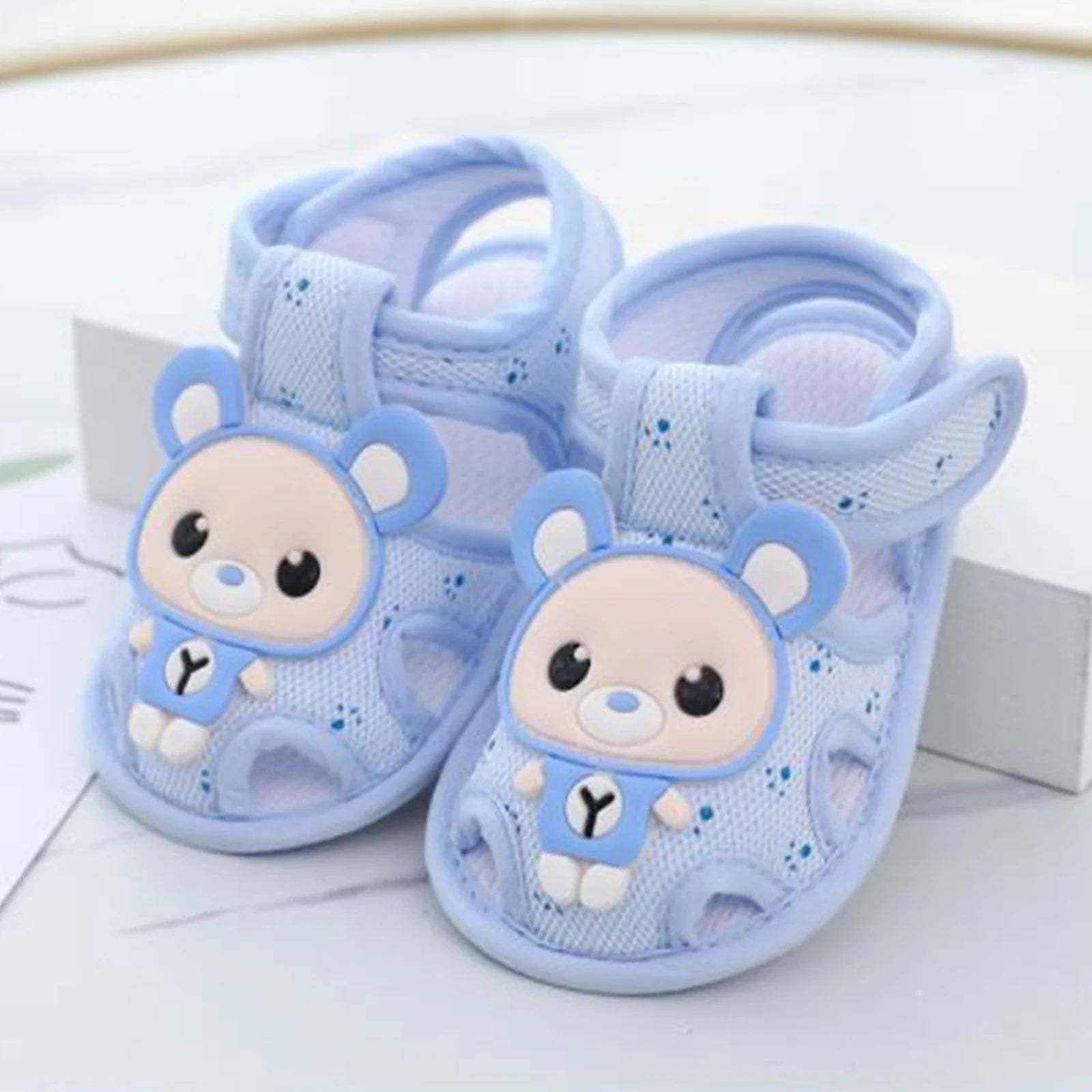 Cute cartoon non-slip baby sandals from Emmababy First Walkers for toddlers, featuring colorful designs and soft cushioning.
