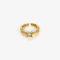 Gold plated stainless steel open ring with vintage moonstone and zircon accents, showcasing elegant jewelry design.