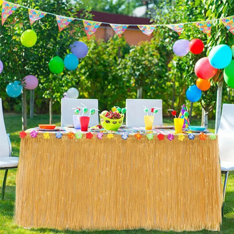 Hawaiian grass table skirt for tropical party decor, showing lush green grass strands on a round table, perfect for summer celebrations.