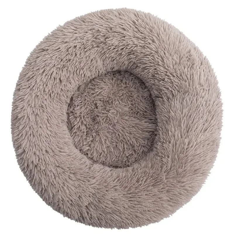 Round plush pet bed by Showlu Fashion Store, soft and warm dog house ideal for large dogs, with cozy cushioning and a comfortable interior.