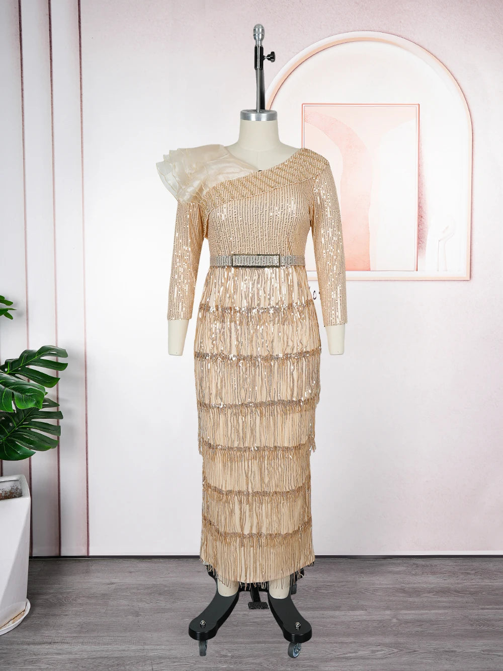 Plus size African party dress for women with dashiki, tassel, sequins, and maxi style, suitable for wedding and evening events.