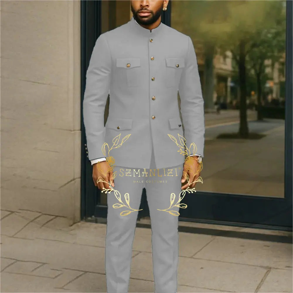 White stand collar men's suit jacket and pants set with single-breasted tuxedo style, perfect for business or wedding attire.