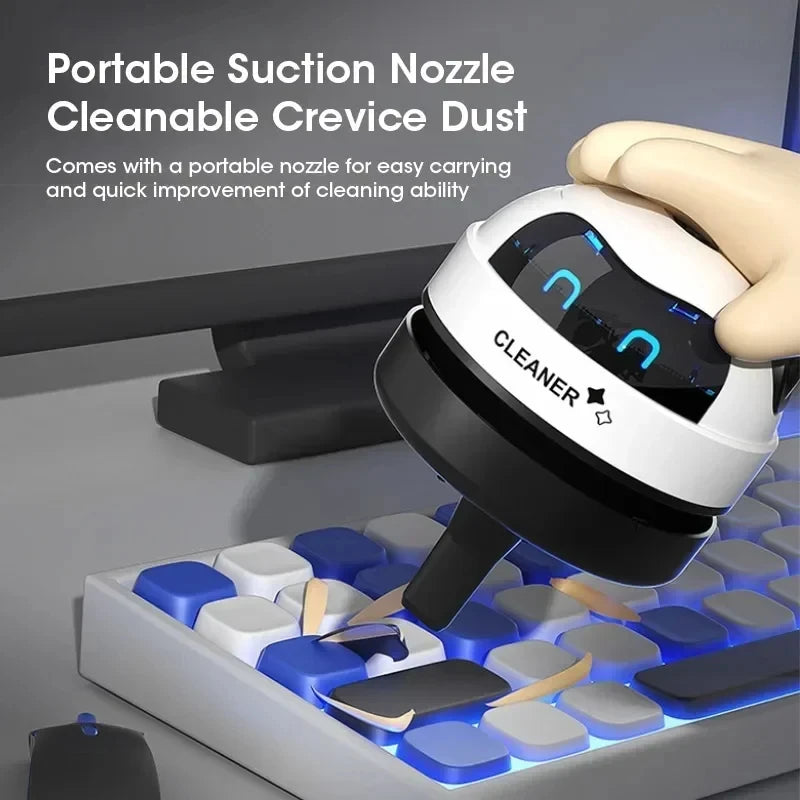 Mini USB Robot Desk Vacuum from Showlu Smart General, compact robot design cleaning dust from a desktop surface.