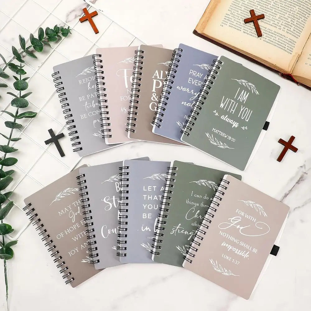 Showlu Christian spiral notebooks and Bible verse pens in a set, featuring colorful covers and inspirational scripture designs.