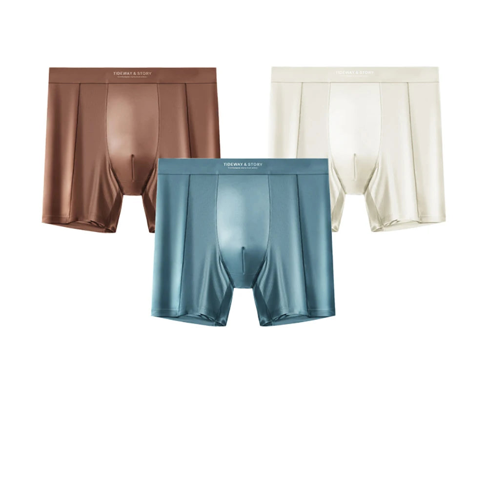 Three pairs of Showlu Fashion men's satin-like boxers featuring breathable, quick-dry ice silk fabric with high elasticity.