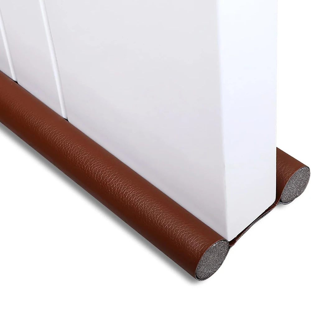 Showlu Smart General anti-dust door seal strip attached to a door frame, preventing dust and drafts from entering.