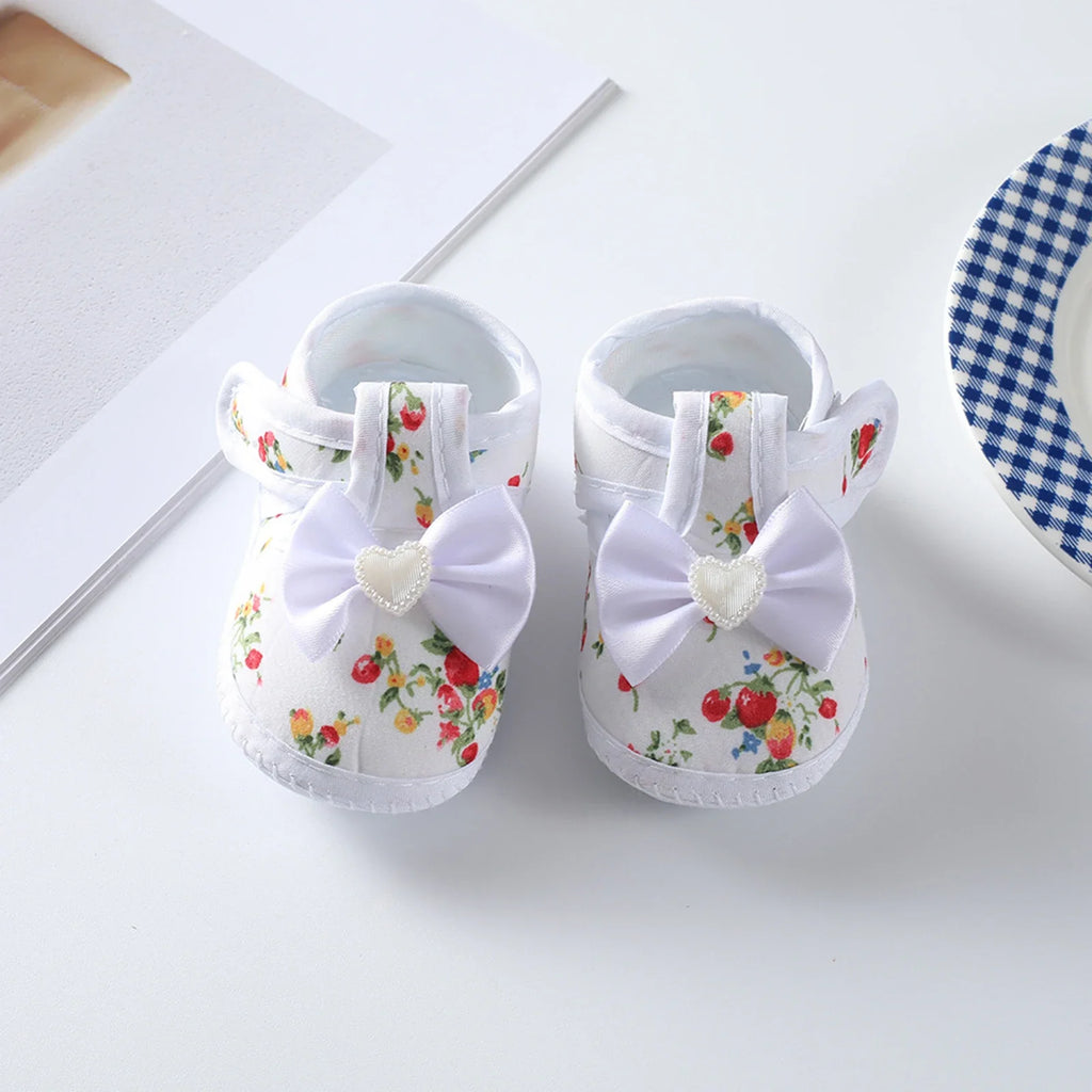 Showlu Baby Girls soft sole flat shoes with flower print, toddler shoes for ages 0-12 months, comfortable and cute footwear.