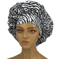 Leopard print women's sleep bonnet with wide elastic band, soft fabric, curl-enhancing, ideal for dry and textured hair.