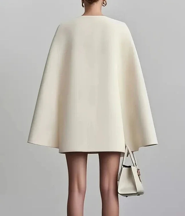 Showlu Fashion Women's V-Neck Double Breasted Shawl Cape Mini Dress in solid color, stylish and versatile for various occasions.