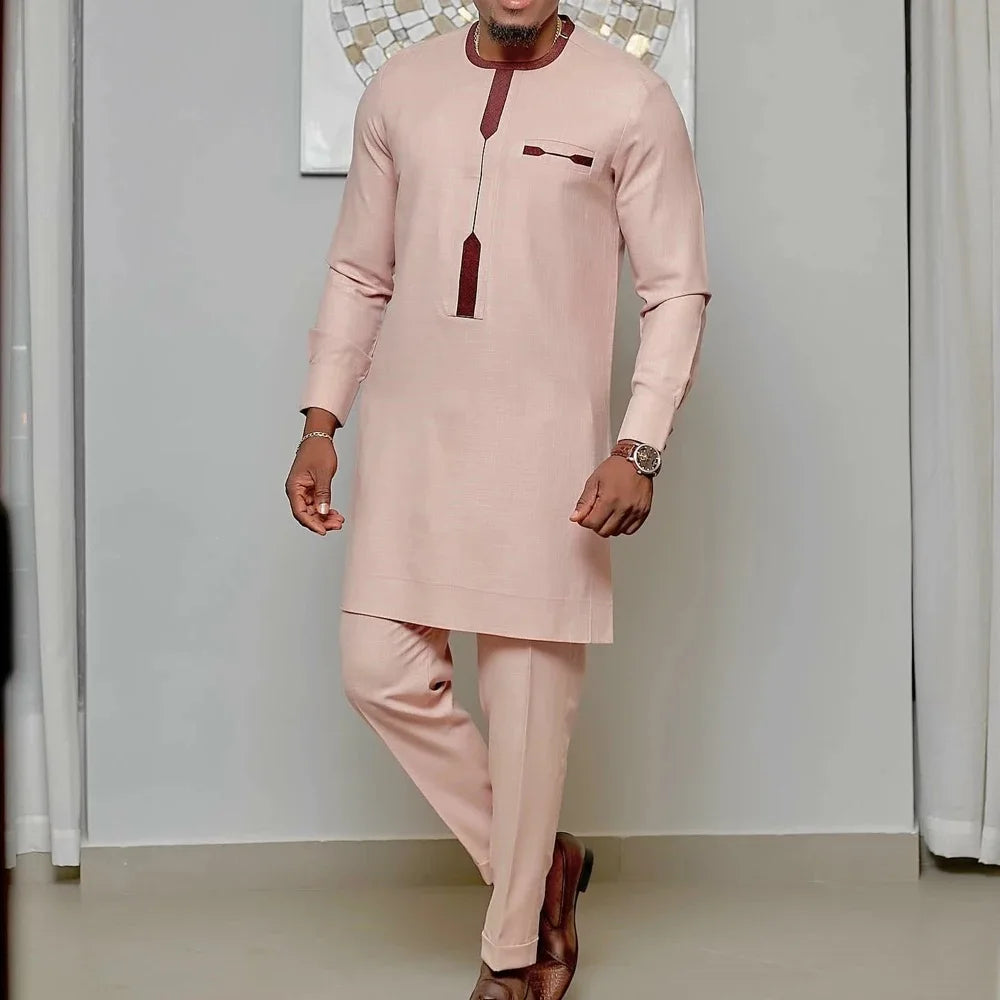 White men's Kaunda suit by Showlu Fashion, traditional African 2-piece cotton set with detailed tailoring and classic style.