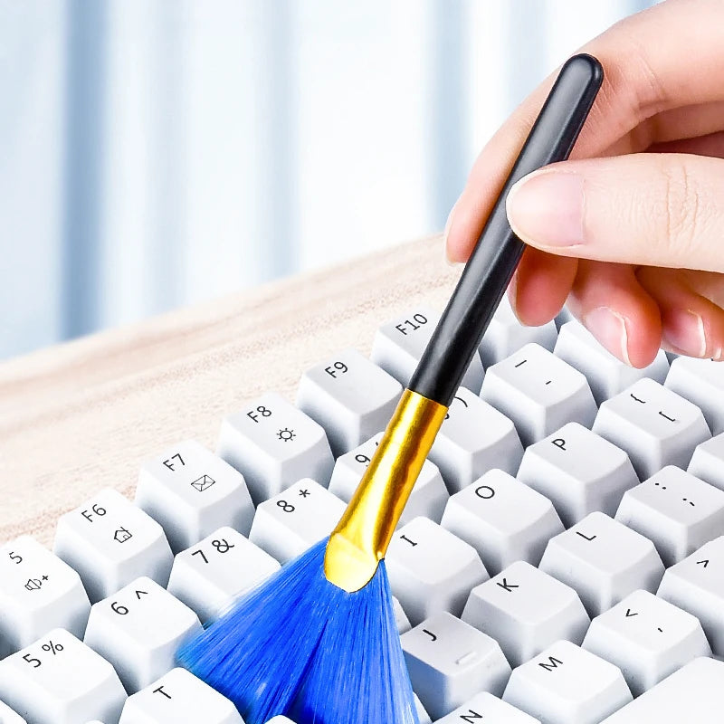 Showlu Smart General LED keyboard cleaner with built-in LED light and cleaning brush, designed for easy keyboard maintenance.