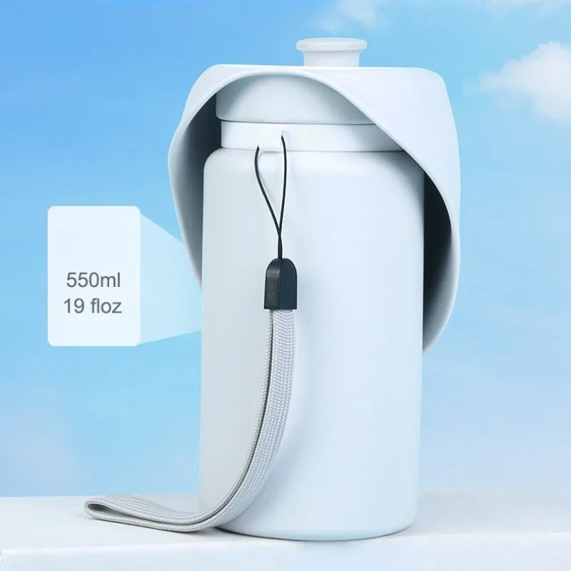 Showlu Collapsible Dog Water Bottle, portable leak-proof pet dispenser with a compact design for on-the-go hydration.