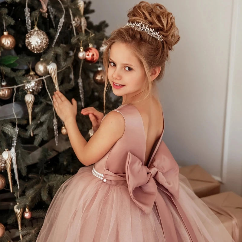 Dusty pink flower girl dress by Showlu Fashion with pearl belt, ball gown style, perfect for weddings and special occasions.