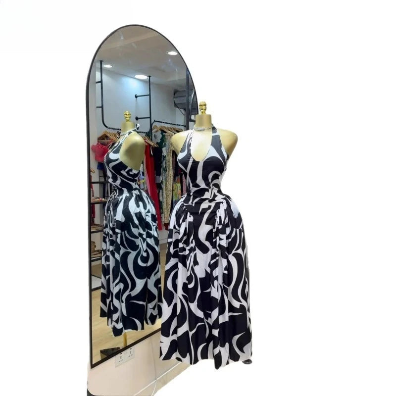 Elegant 2025 women’s V-neck sleeveless halter print midi dress with backless design, perfect for birthday and beach parties, by Showlu Fashion.