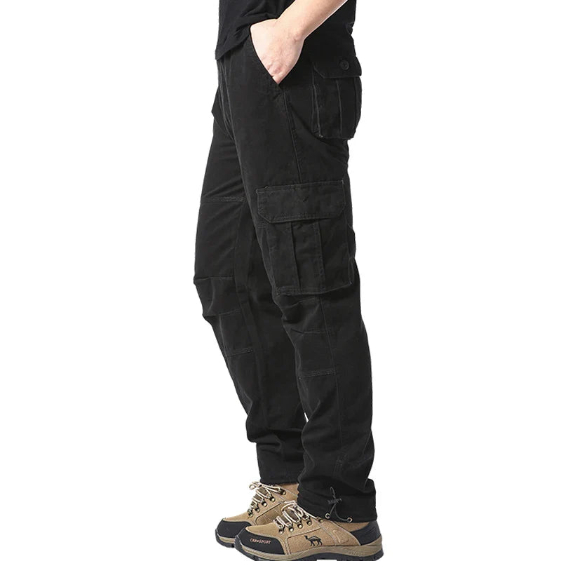 Men's cotton cargo pants by SHOWLU FASHION STORE, loose fit tactical jogging overalls with multiple pockets and durable fabric.
