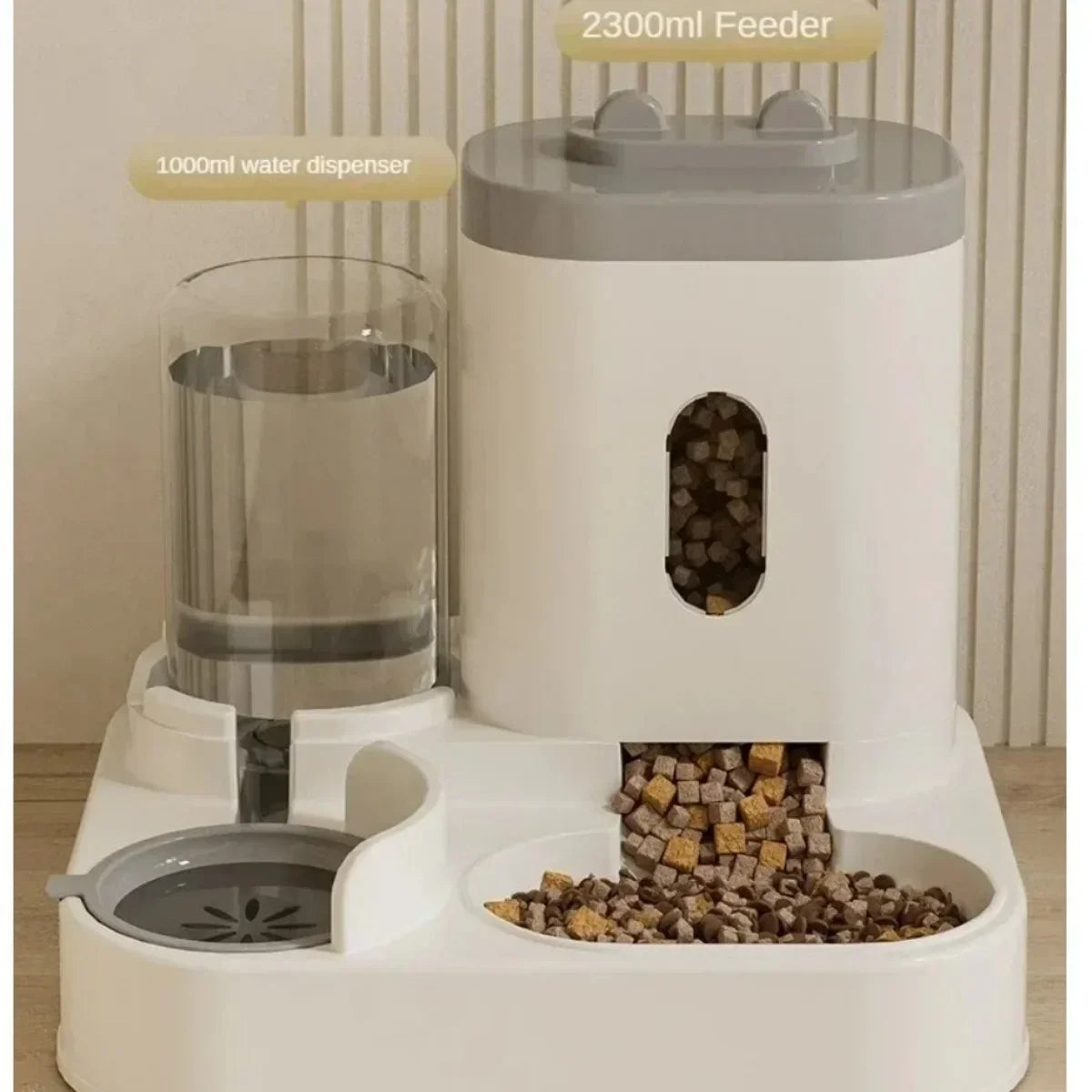 Showlu Automatic Pet Feeder and Water Fountain with large capacity food bowl for pets, featuring a sleek design and efficient dispensing.