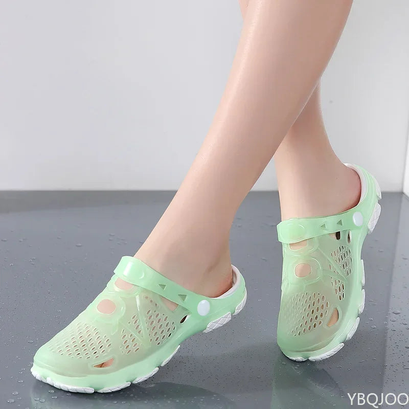Showlu Women's casual jelly sandals in bright colors, flat outdoor beach water shoes with breathable, waterproof material and slip-on design.