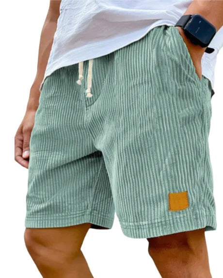 Men's retro corduroy casual shorts from Showlu Fashion, solid color, lightweight, relaxed fit, suitable for casual and streetwear styles.
