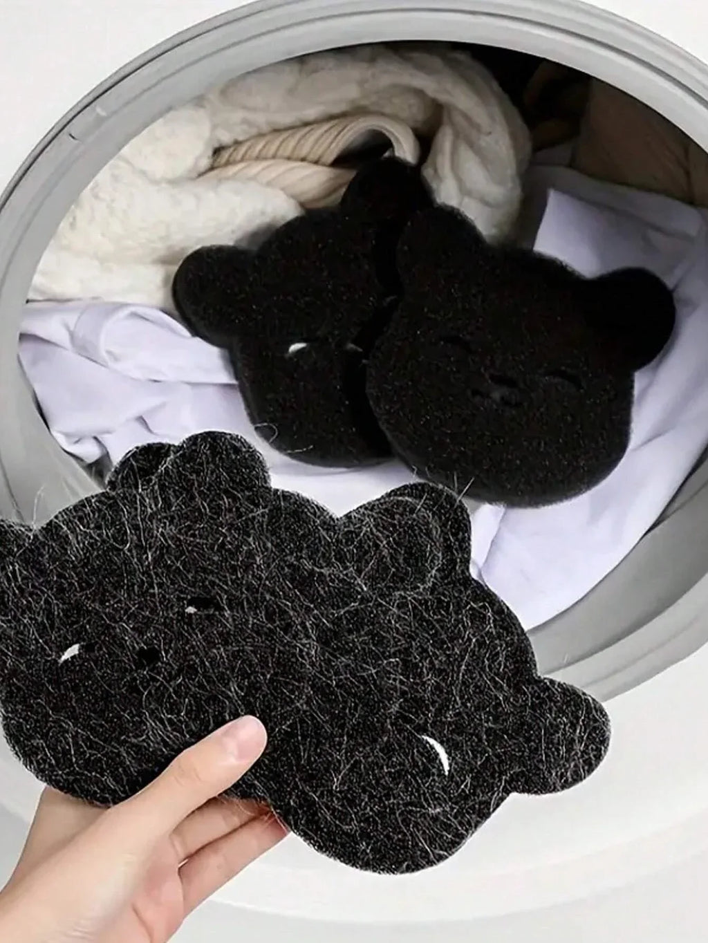 Reusable lint catcher for washing machines by Showlu Smart General, showing the mesh filter and attachment for laundry cleaning.