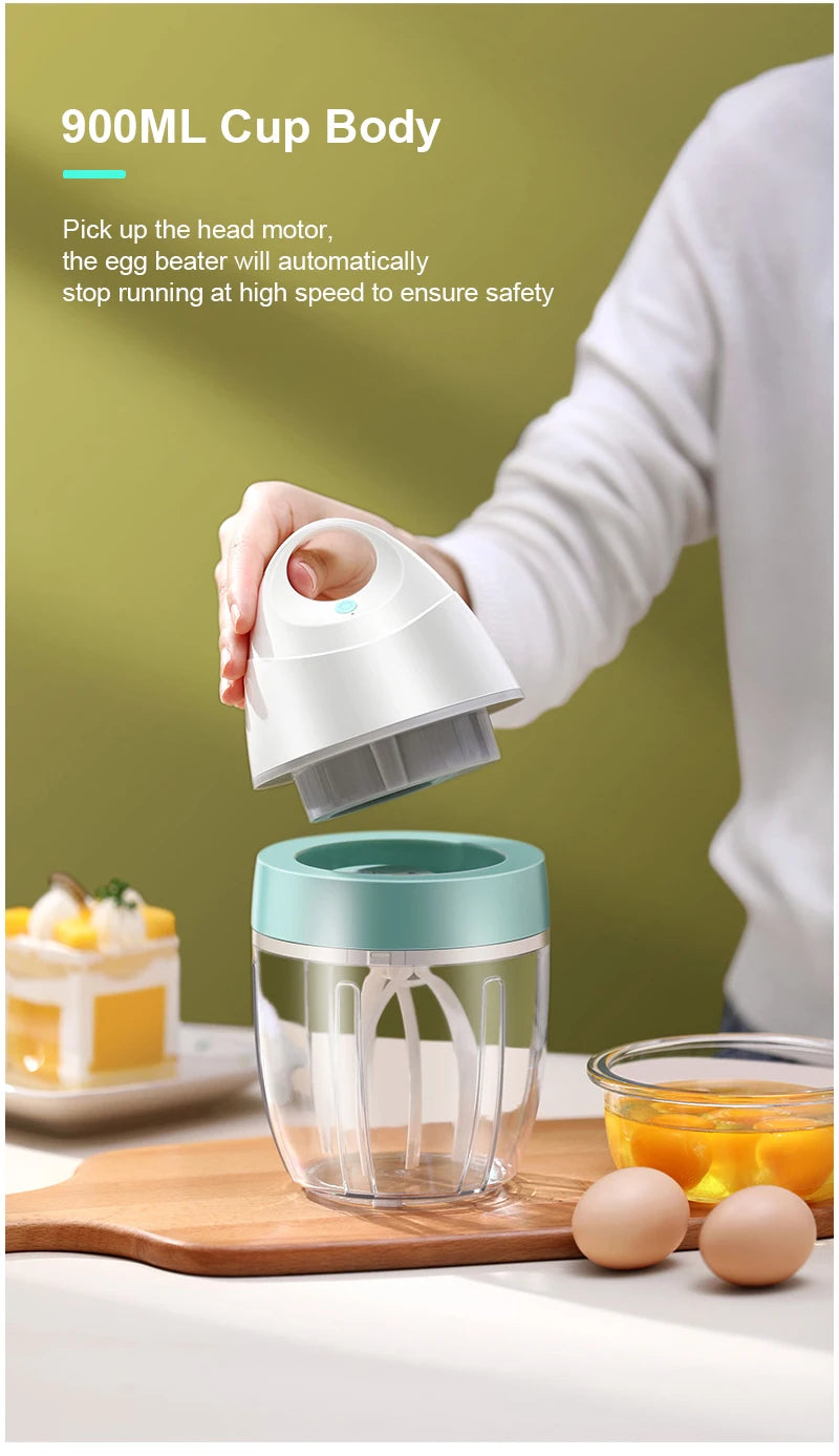 Showlu Smart General USB electric egg beater handheld mixer with mini whisk for cream and cake batter in a kitchen setting
