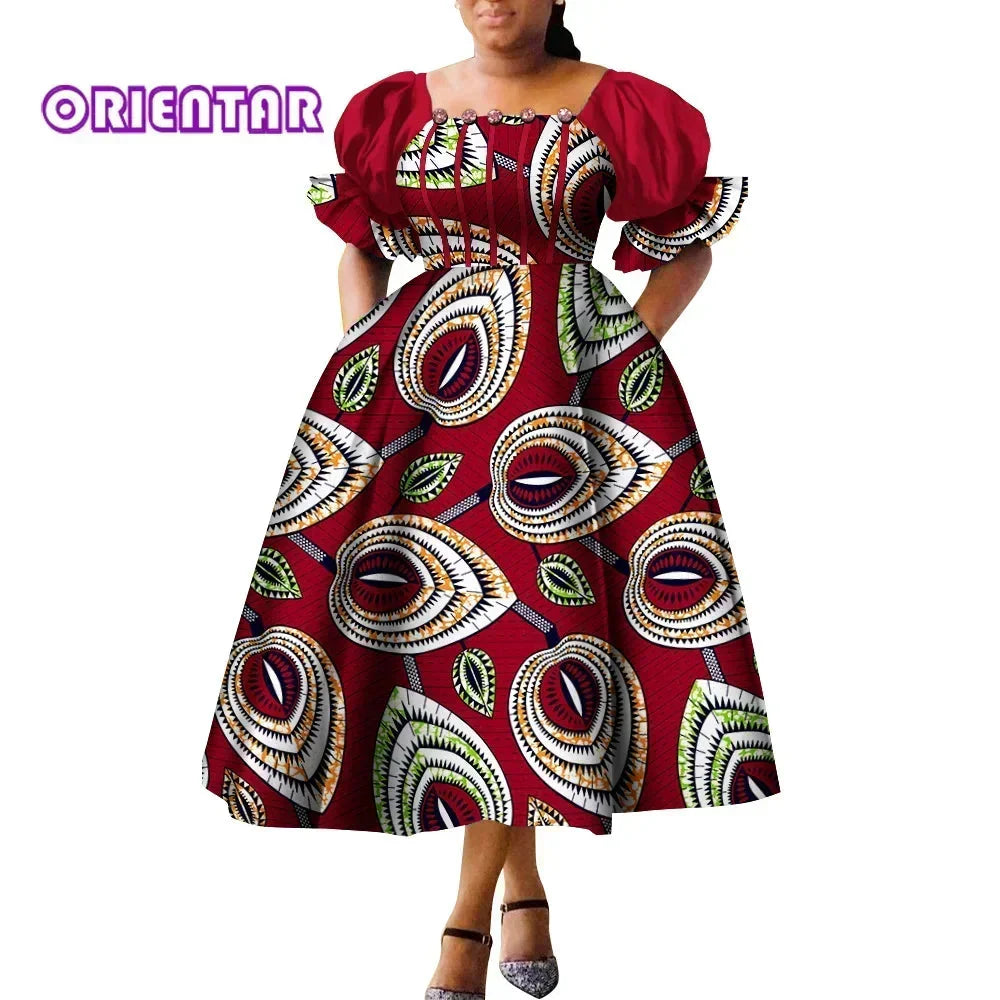 African print puff sleeve high waist Ankara cotton gown by SHOWLU FASHION STORE featuring vibrant patterns and elegant design.
