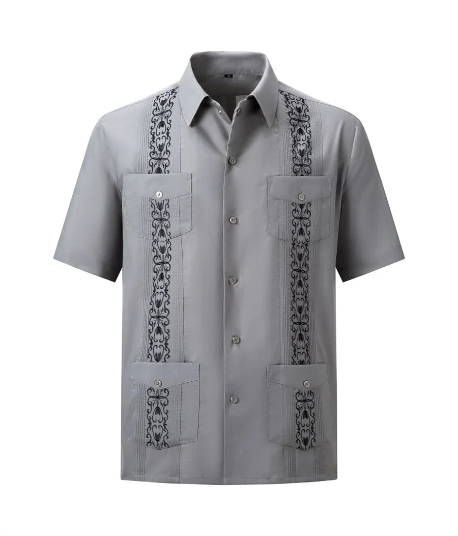 Men's white Guayabera shirt with embroidered Cuban style, featuring traditional details and lightweight fabric from Showlu Fashion.