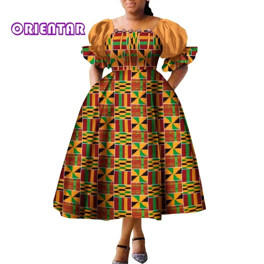 African print puff sleeve high waist Ankara cotton gown by SHOWLU FASHION STORE, featuring vibrant colorful patterns and elegant design.