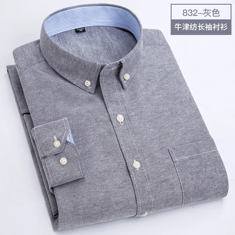 Showlu men's slim fit Oxford shirt with long sleeves, non-iron casual top in classic white fabric, neatly pressed and styled.