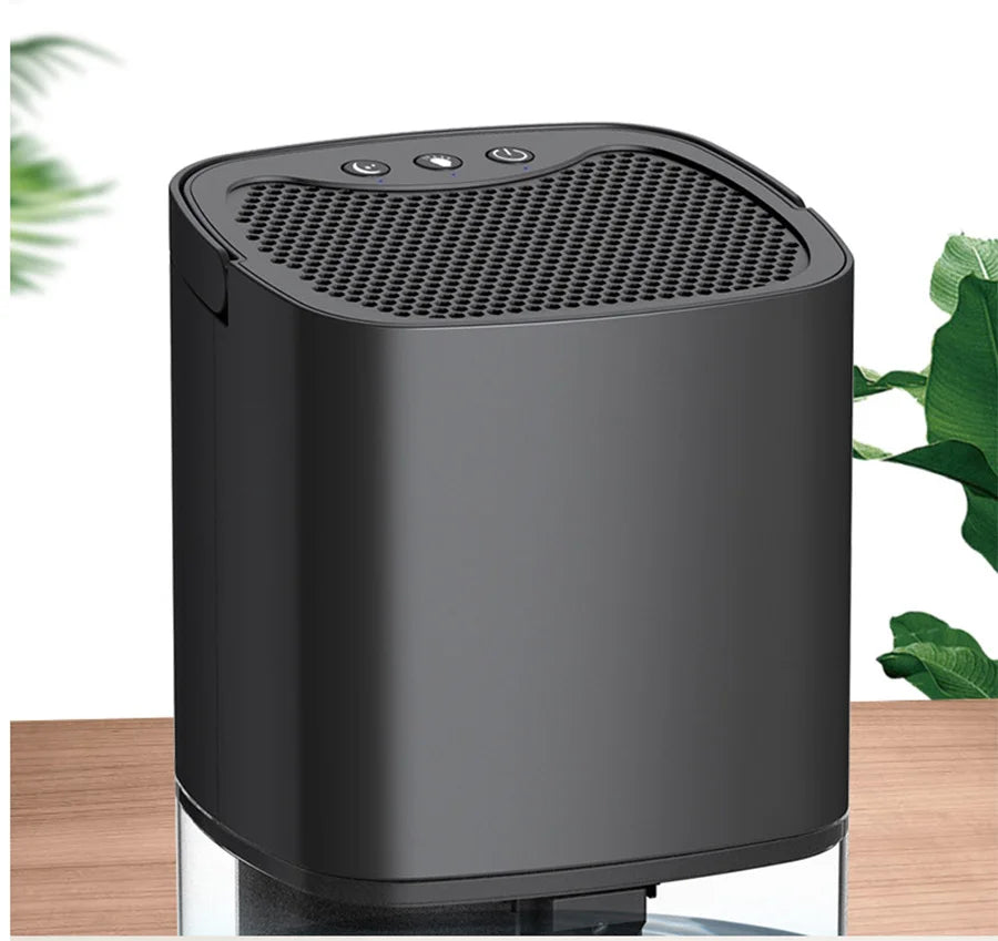 Xiaomi Mini Electric Dehumidifier 1000ML by Showlu Smart General, compact device with water container and sleek design.