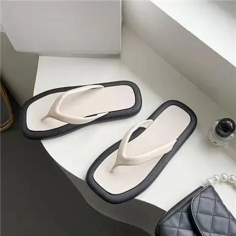 Women's summer flip flops by SHOWLU FASHION STORE, flat PVC slides with fashion-forward sandal design and open toe style.
