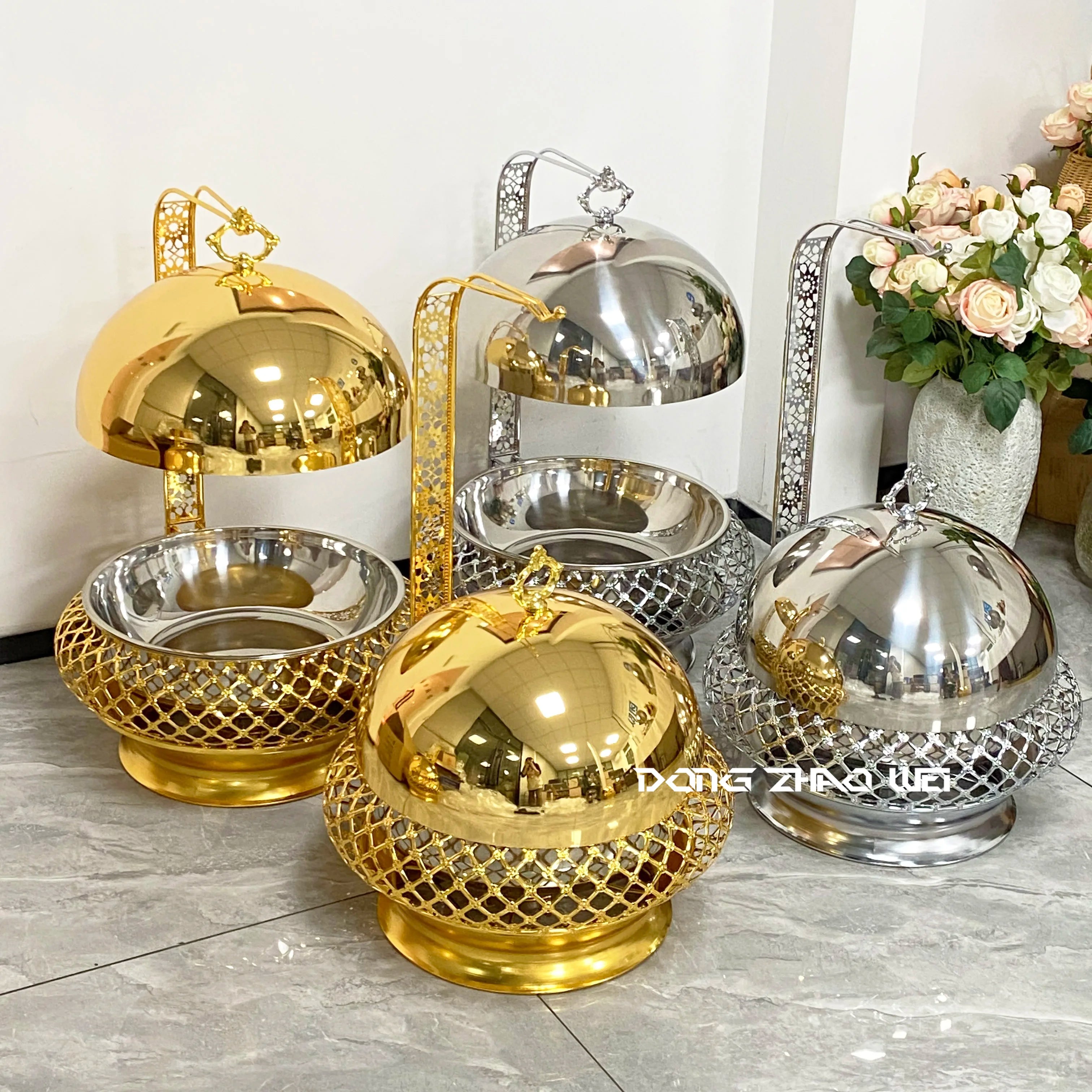 Stainless steel wedding party chafing dish for buffet serving, featuring a luxurious design and hanging setup for catering events.