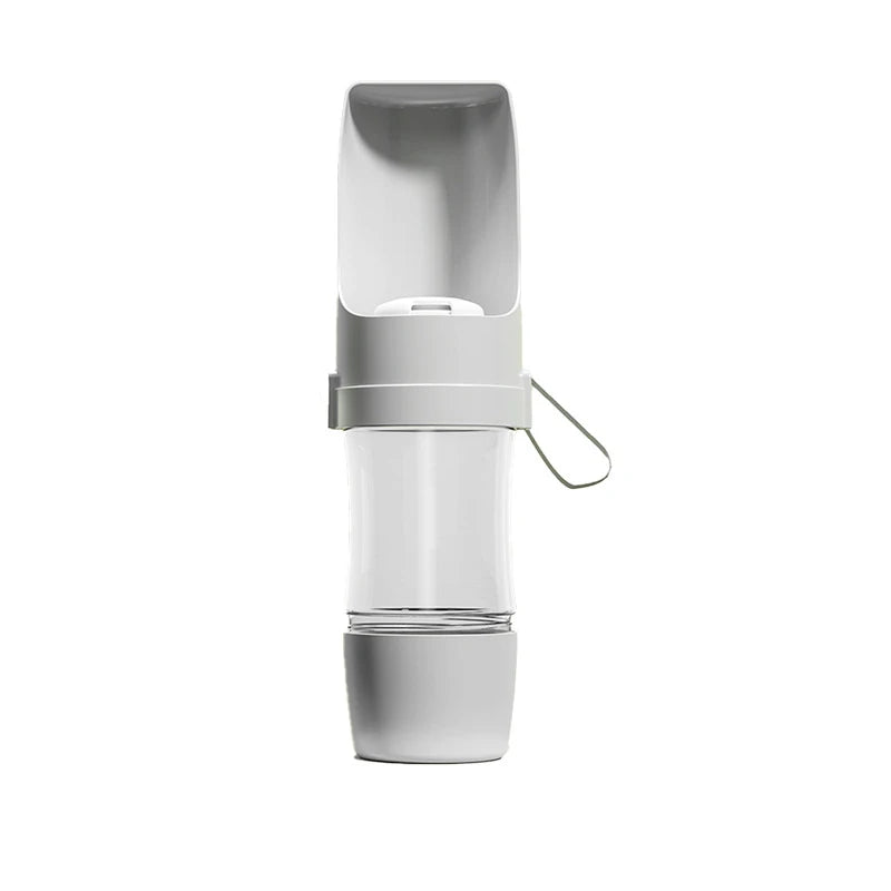 Showlu 2-in-1 portable pet water bottle and food container, 500ml, with a compact design for travel and outdoor use.
