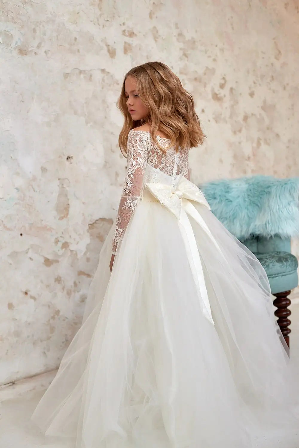 Ivory lace tulle flower girl dress by Showlu Fashion Store, ball gown style with elegant floral details and a full skirt.