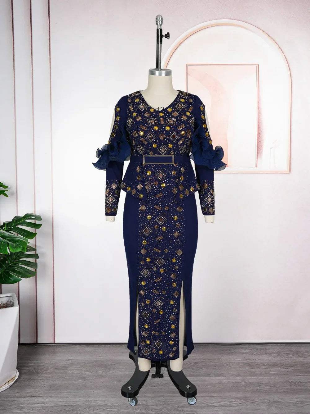 Elegant African women's long evening gown with intricate patterns, suitable for weddings and parties in autumn 2025.