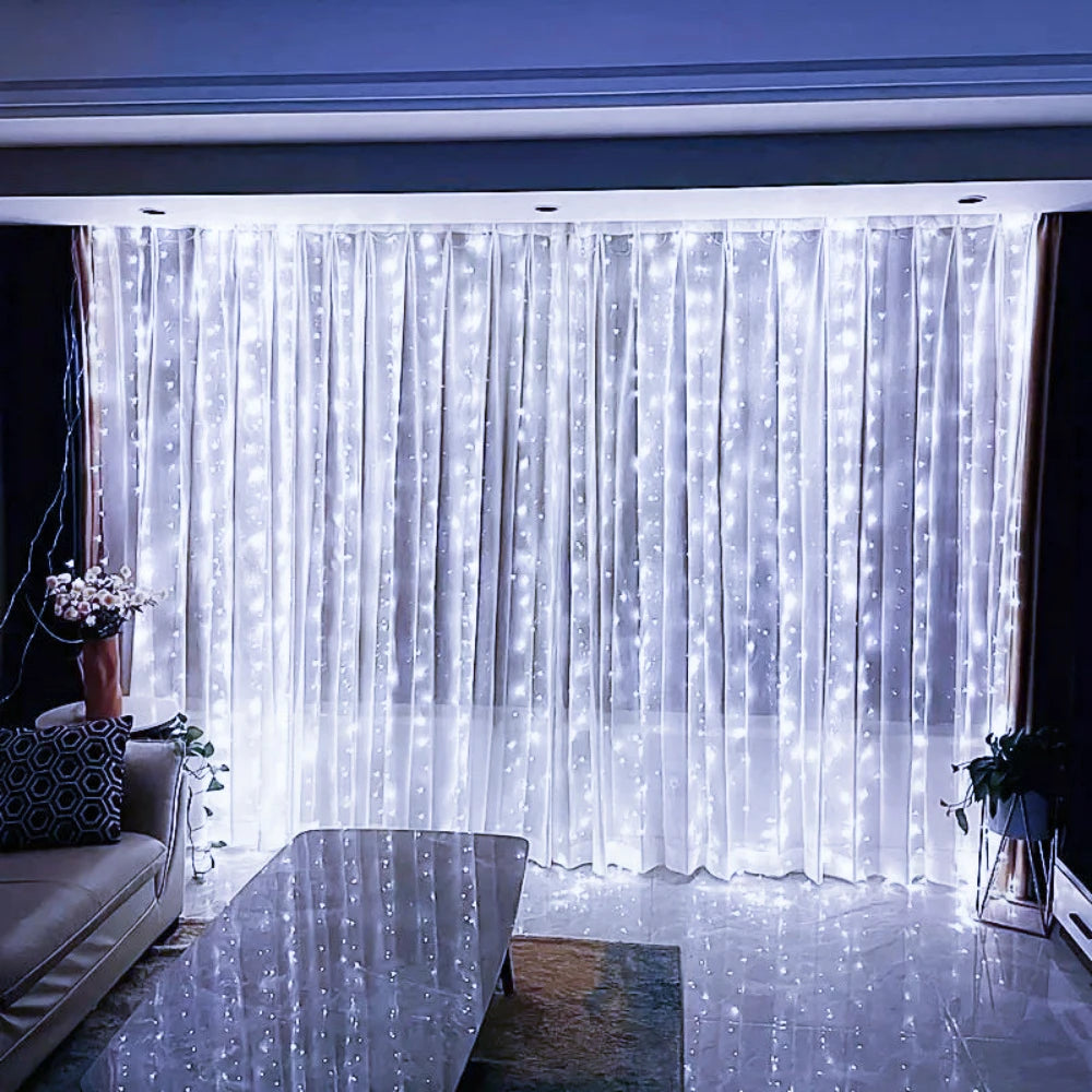 Showlu Smart LED curtain fairy lights hanging with warm glow, ideal for home decor and festive ambiance.