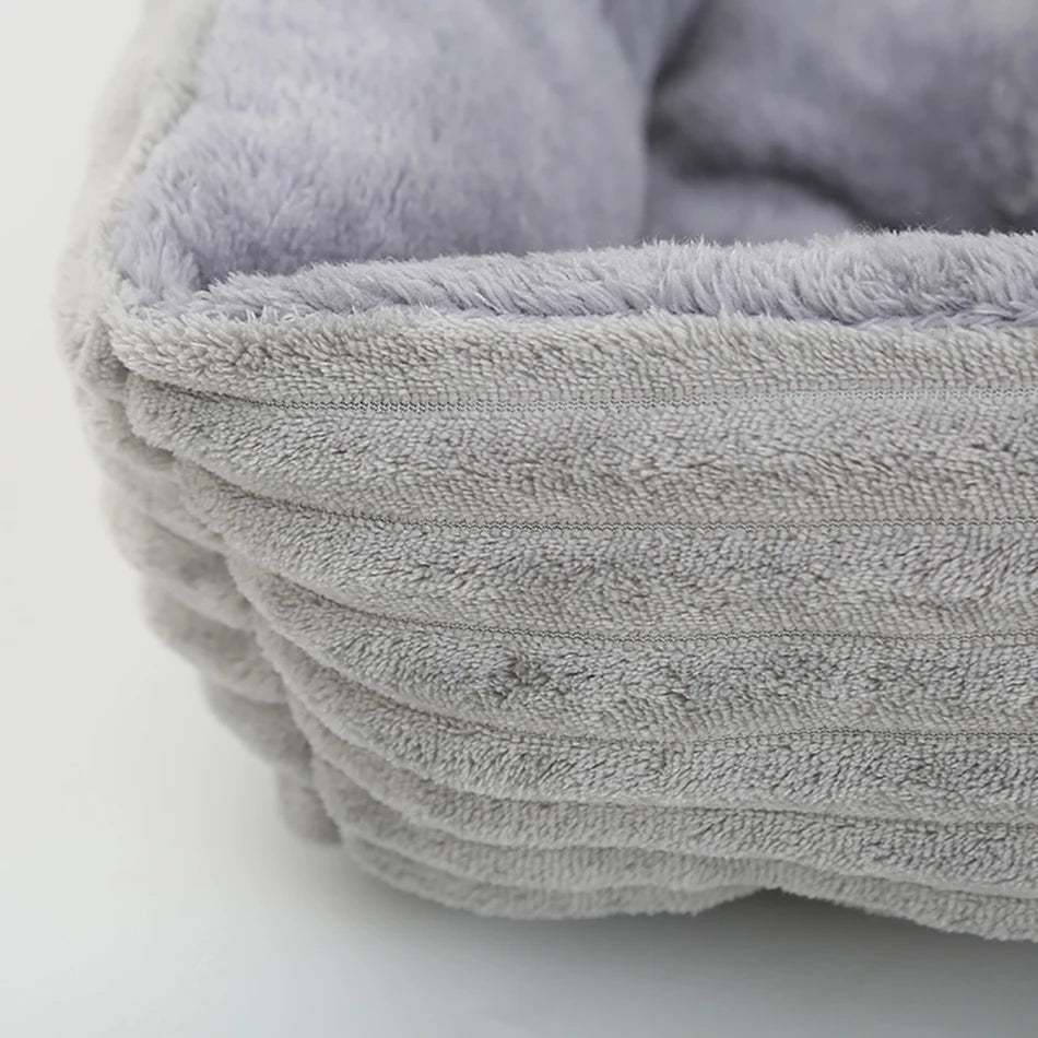 Showlu Fashion square plush calming dog bed with waterproof Oxford fabric, soft pet sofa for comfort and relaxation.