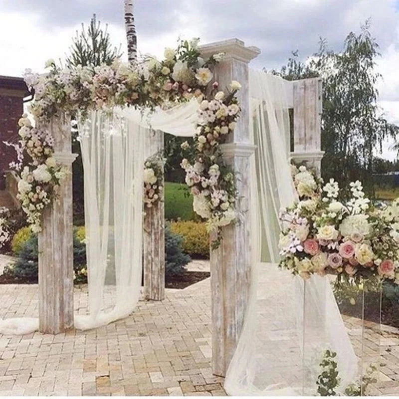 Wedding organza roll with sheer crystal tulle fabric for wedding arches, party backdrops, and baby shower decorations.