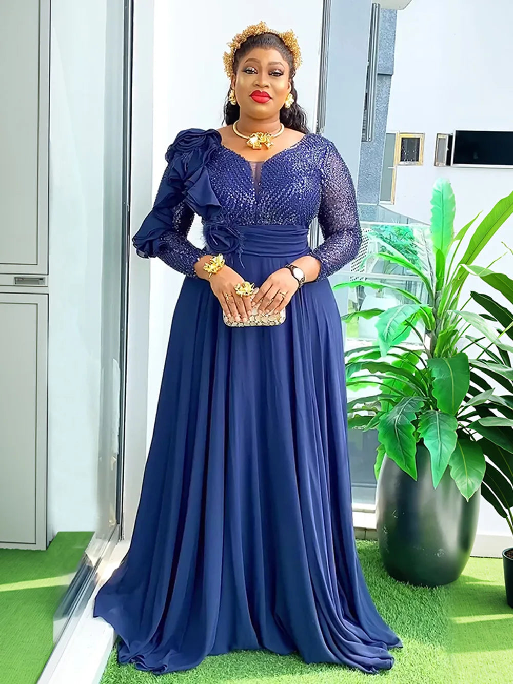 Elegant African long dress for women featuring vibrant Ankara print, perfect for weddings, parties, or special occasions.
