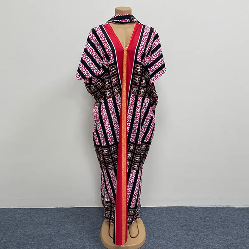 Elegant 2026 African traditional dress for women featuring vibrant dashiki Ankara fabric and a long, flowing gown style.