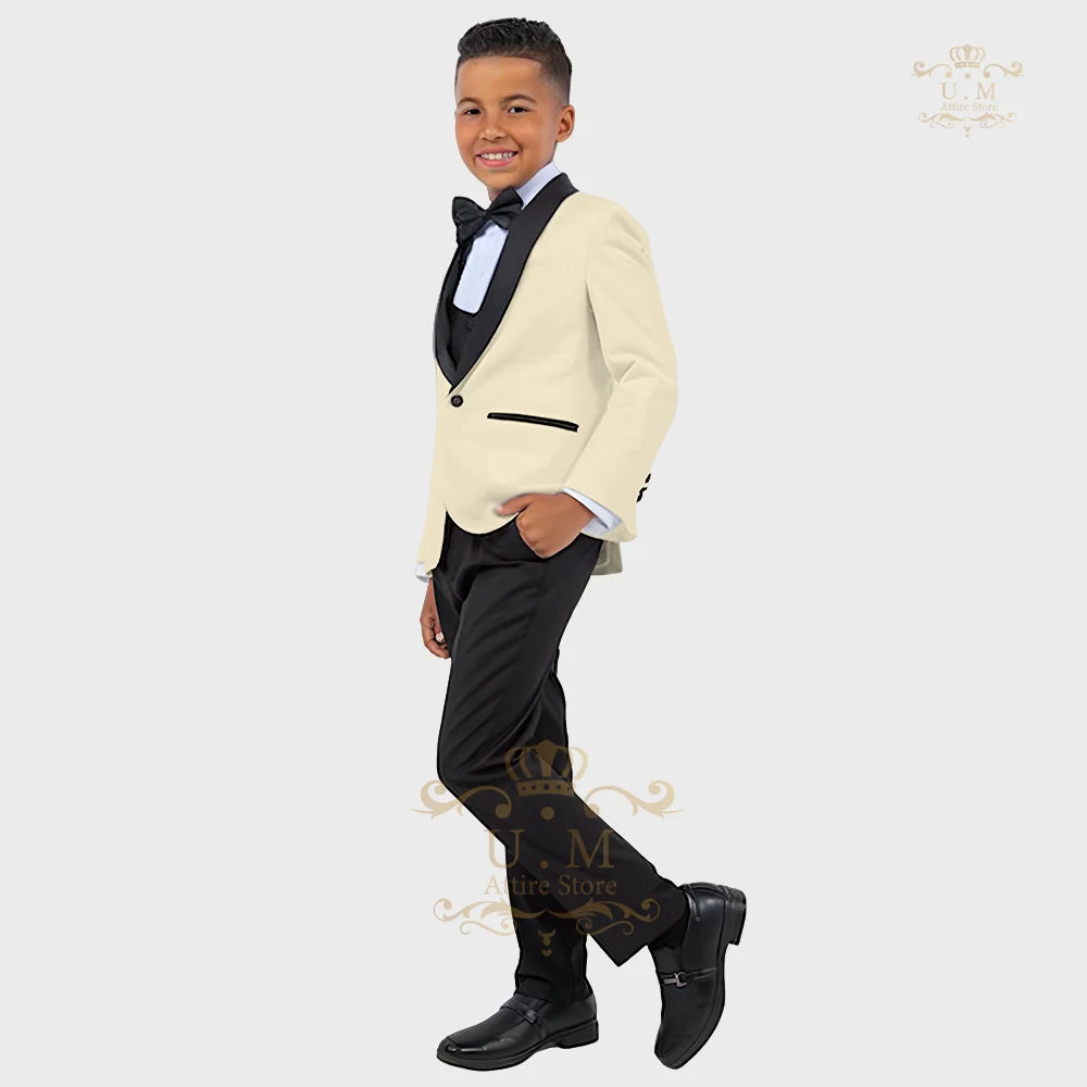 Boy's white tuxedo suit set by SHOWLU FASHION STORE, includes jacket, vest, and pants, perfect for formal occasions.