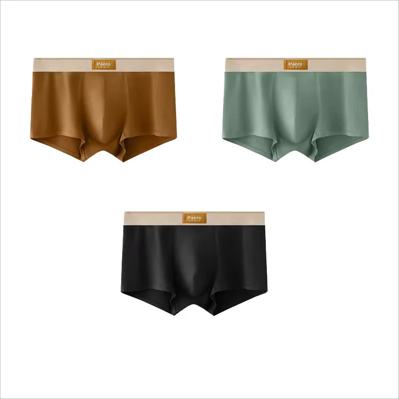 Set of four men's cotton boxer shorts with breathable, comfortable fit in large sizes, featuring sporty design and men's underwear style.