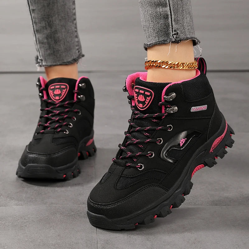 Women's waterproof outdoor hiking boots with slip-resistant soles, ankle support, and safety features for walking and work activities.